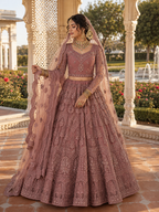 Mauve Pink Heavy Embroidered Bridal Lehenga with Sheer Sleeves & Net Dupatta
