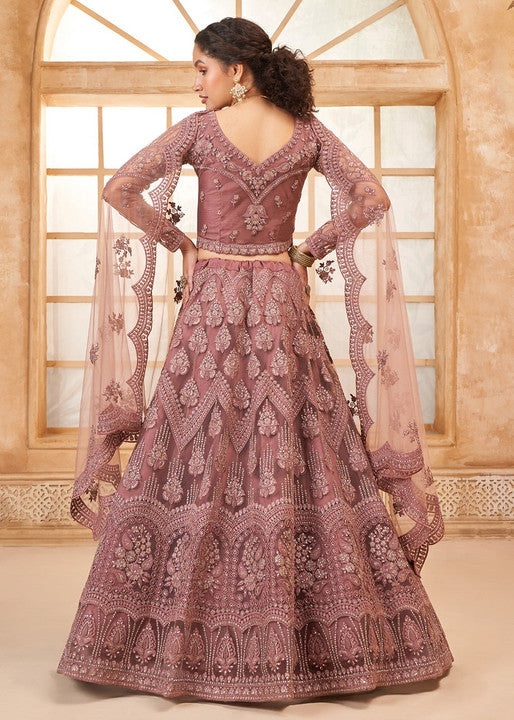 Mauve Pink Heavy Embroidered Bridal Lehenga with Sheer Sleeves & Net Dupatta